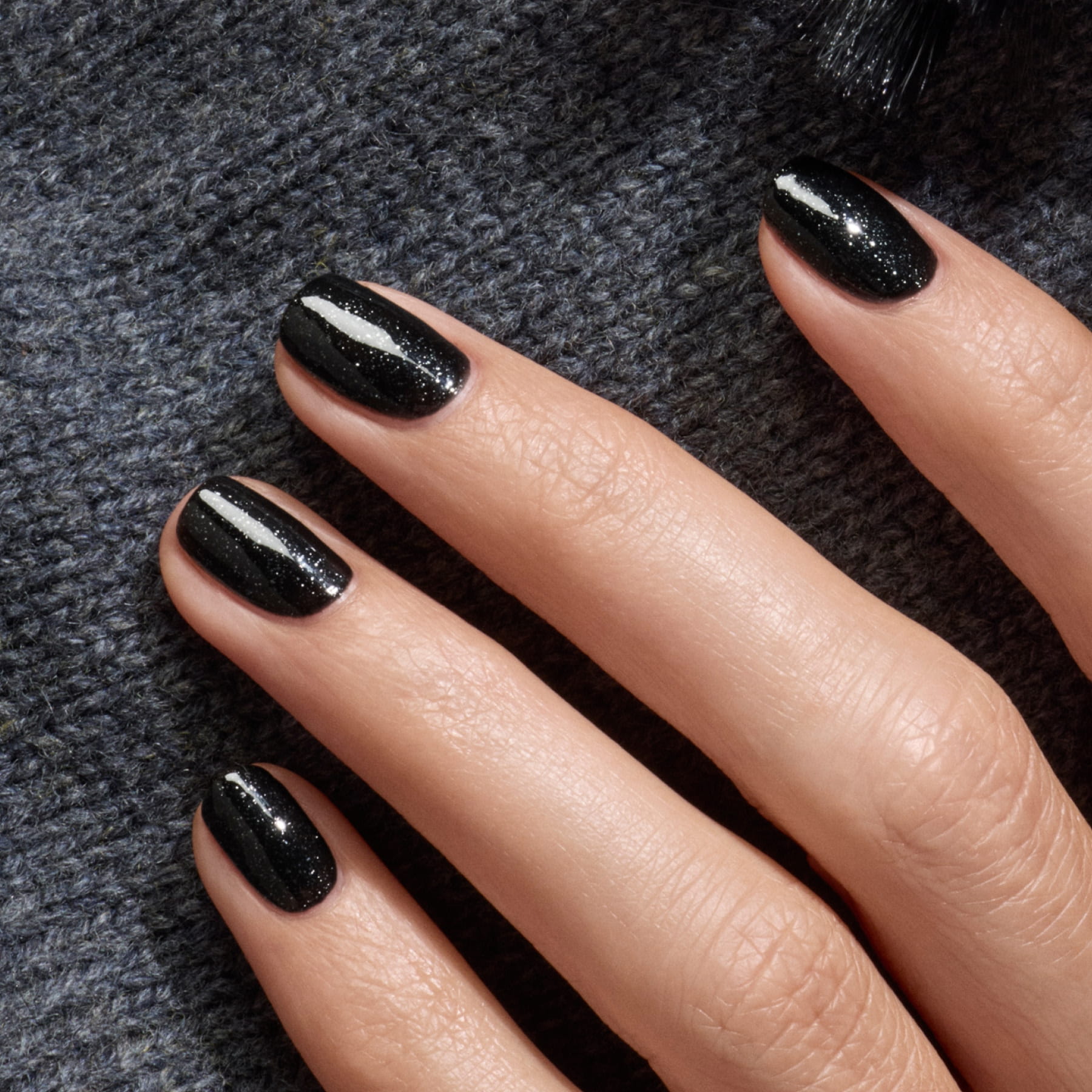 Manucurist Green Sparks vernis à ongles noir pailleté argent