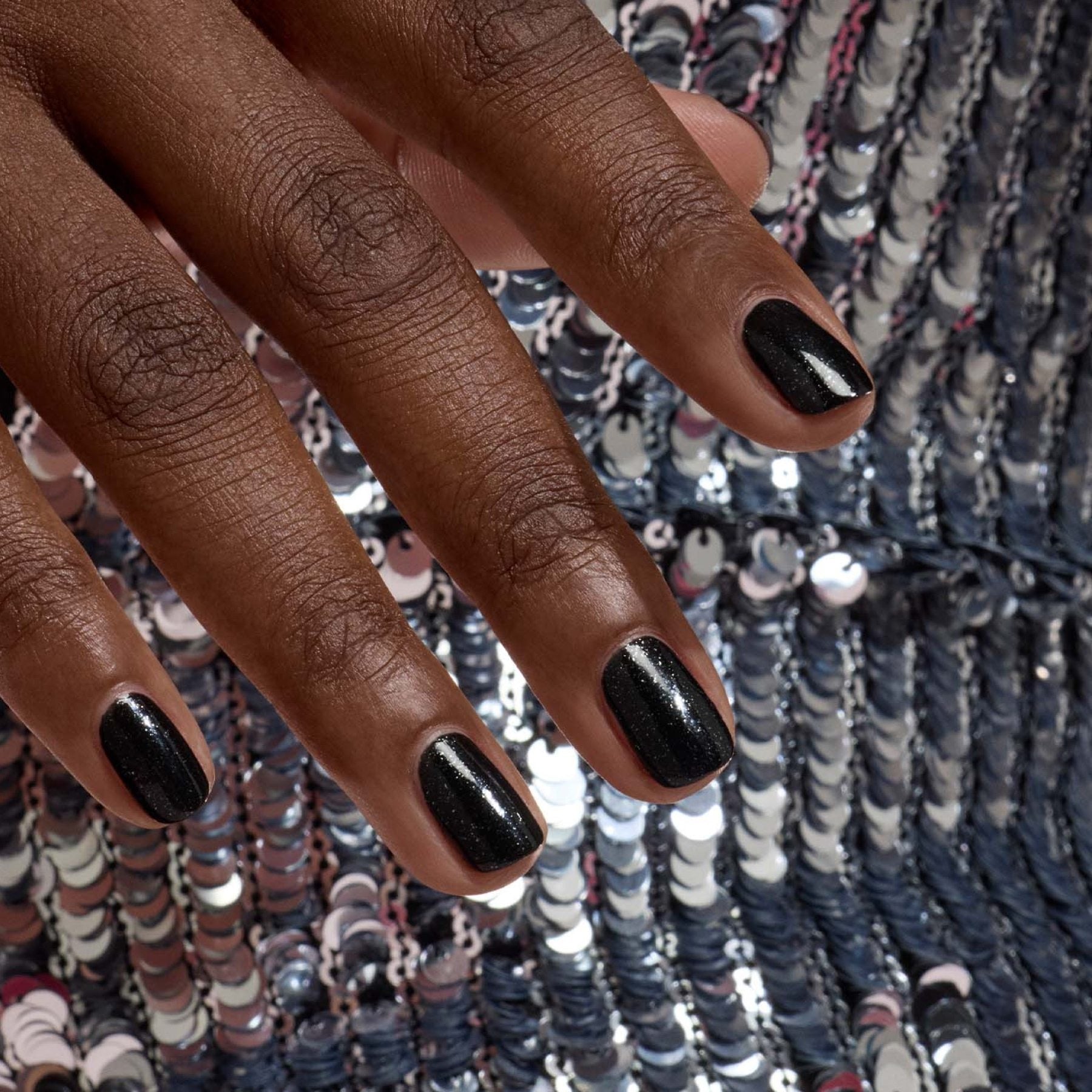 Manucurist Green Sparks vernis à ongles noir pailleté argent
