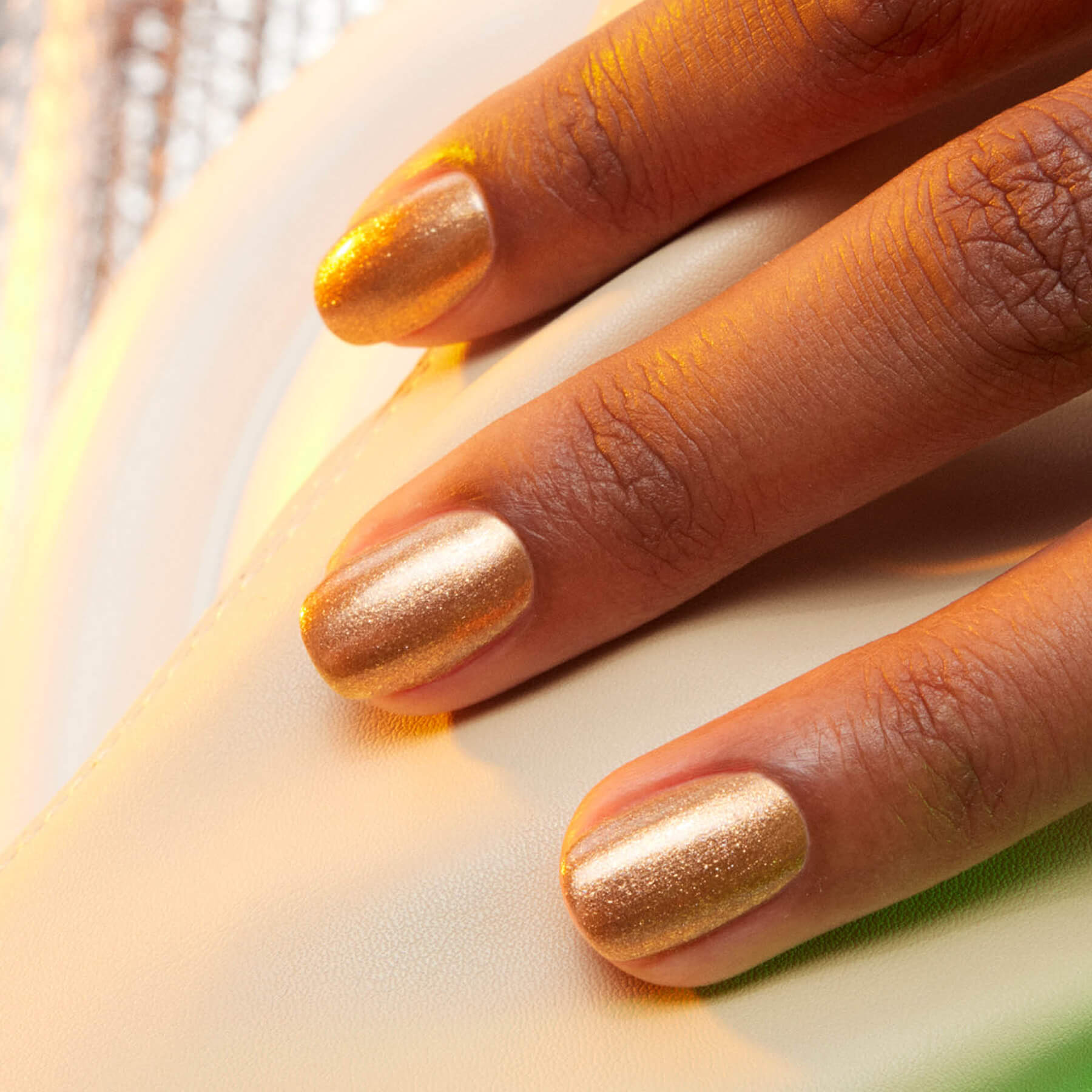 Manucurist Green vernis à ongles Shimmer bronze pailleté